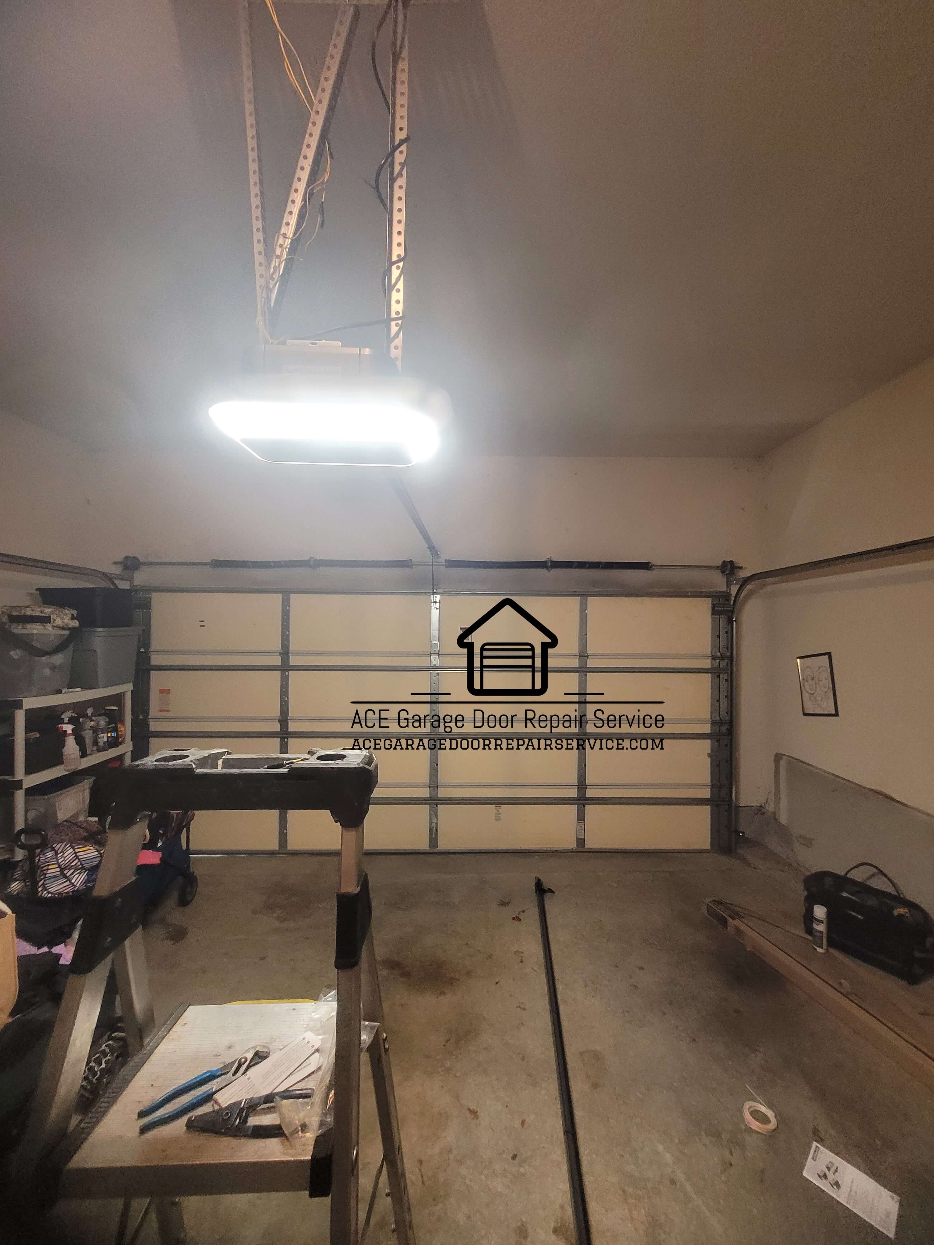 acegaragedoorrepairservice.com_four_garage_door_torsion_spring_system_replacement