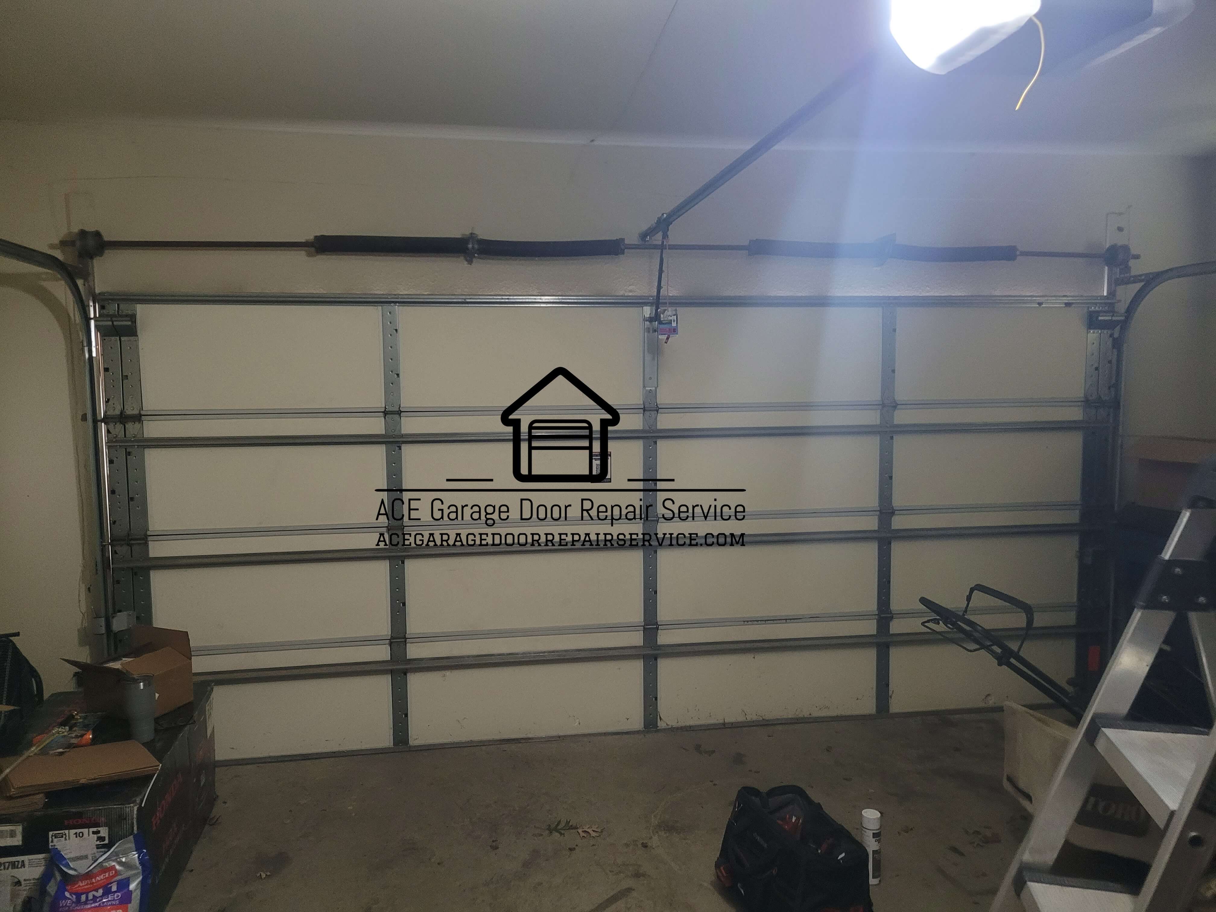 acegaragedoorrepairservice.com_garage_door_lifttime_torsion_springs_replacement