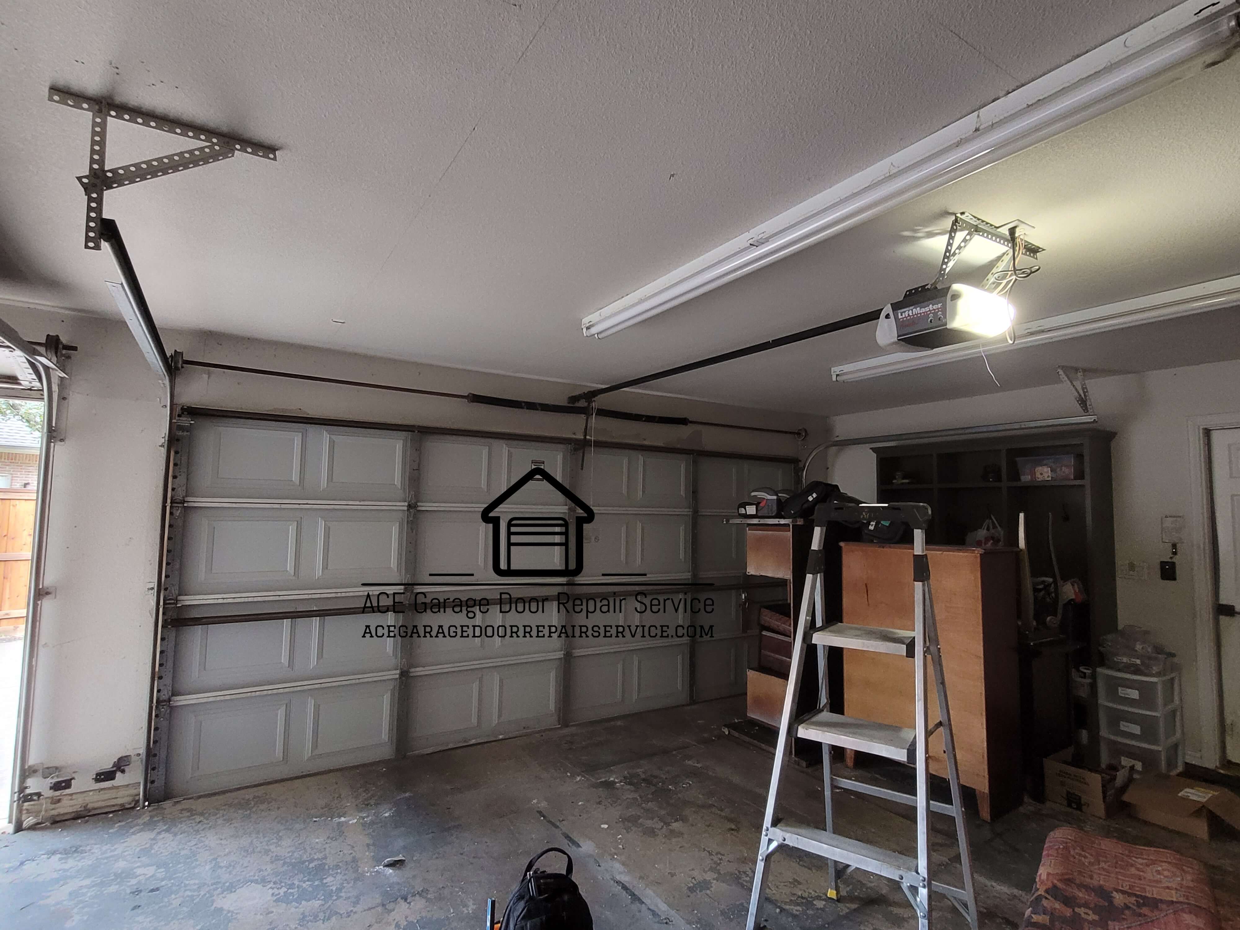 acegaragedoorrepairservice.com_garage_door_torsion_spring_replacement